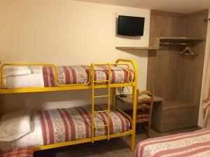Posteľ alebo postele v izbe v ubytovaní Hotel Piccolo Mondo