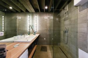 Kylpyhuone majoituspaikassa Deluxe Apartments Santa Lucia