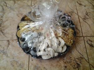a basket of donuts in a plastic bag on the floor at Azur Tafraout in Tafraoute