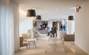 Posezení v ubytování Essence Inn Marianos Hotel