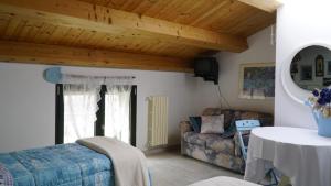 A bed or beds in a room at Agriturismo Sorgente di Luna