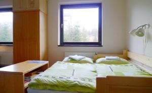 Postel nebo postele na pokoji v ubytování Apartman Mariana + 52 fotografií