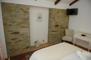 Posteľ alebo postele v izbe v ubytovaní Casa da Fraga