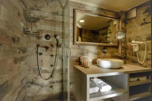 a bathroom with a sink and a shower at Congo Palace in Athens