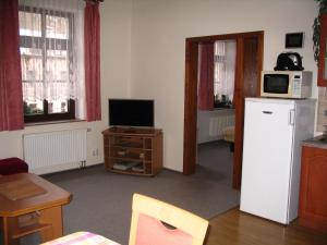 Kuchyň nebo kuchyňský kout v ubytování Apartmany Ingeborg