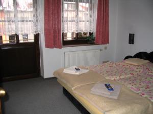 Postel nebo postele na pokoji v ubytování Apartmany Ingeborg