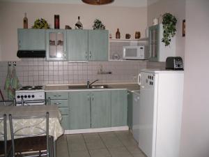 Kuchyň nebo kuchyňský kout v ubytování Apartmany Ingeborg