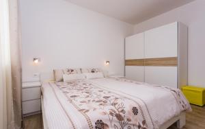 Postel nebo postele na pokoji v ubytování Apartments Matea I