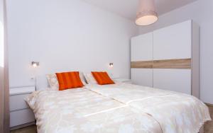 Postel nebo postele na pokoji v ubytování Apartments Matea I