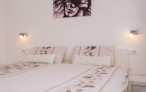 Postel nebo postele na pokoji v ubytování Apartments Matea I