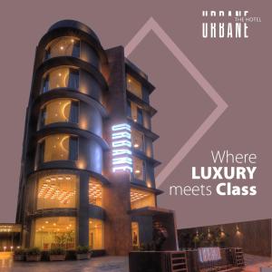 a building with the words where luxury meets class at Urbane The Hotel in Ahmedabad