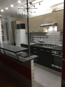 A kitchen or kitchenette at Apartment SCIROCCO Prague - Two Bedroom Apartment