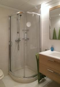 a bathroom with a shower and a sink at Lovely House with views in Marina del Este in Almuñécar