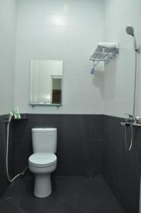 Kúpeľňa v ubytovaní Surya Darma Homestay