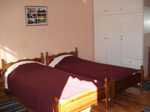 A bed or beds in a room at Zephyros
