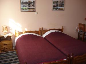 A bed or beds in a room at Zephyros