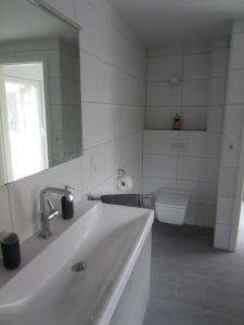 Ein Badezimmer in der Unterkunft Ferienhaus Kluntje