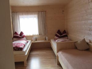 Una cama o camas en una habitación de Ebner Casa