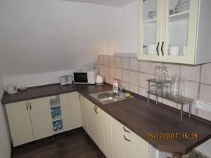 Kuchyňa alebo kuchynka v ubytovaní Apartment-Chalet-Chaloupka U Trnků