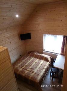 Postel nebo postele na pokoji v ubytování Turul