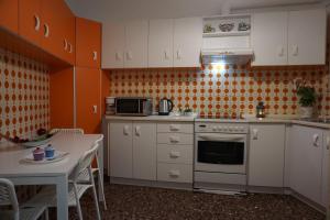 Kuchyň nebo kuchyňský kout v ubytování Seaview apartment