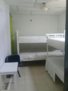 Hotel Paseo Bolivar客房内的一张或多张床位