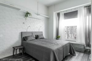 Katil atau katil-katil dalam bilik di Hungerborg City Home