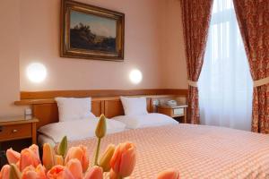 Voodi või voodid majutusasutuse Hotel Pavlov toas