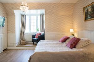 Katil atau katil-katil dalam bilik di Halmstad Hotell & Vandrarhem Kaptenshamn