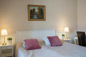 Katil atau katil-katil dalam bilik di Halmstad Hotell & Vandrarhem Kaptenshamn