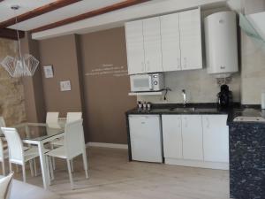 Kuchyňa alebo kuchynka v ubytovaní Apartamento Ribera Del Puente