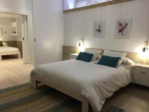 Posteľ alebo postele v izbe v ubytovaní Apartamento Ribera Del Puente