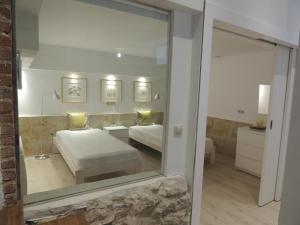 Posteľ alebo postele v izbe v ubytovaní Apartamento Ribera Del Puente