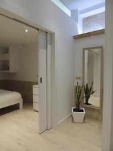 Posteľ alebo postele v izbe v ubytovaní Apartamento Ribera Del Puente
