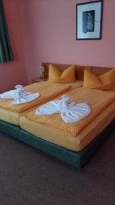 Postel nebo postele na pokoji v ubytování Hotel "An der Warthe" + 7 fotografií