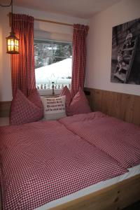 Ein Bett oder Betten in einem Zimmer der Unterkunft Apart Silvana