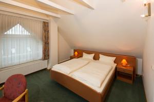 Postel nebo postele na pokoji v ubytování Hotel Ideal