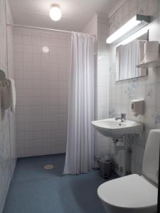 Koupelna v ubytování Hotel Åberg Centralhotellet