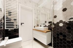 Kúpeľňa v ubytovaní Apartament Dębowy