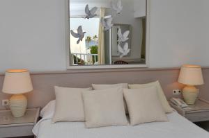 A bed or beds in a room at Astir Of Paros