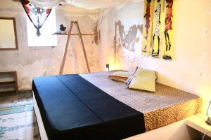 Katil atau katil-katil dalam bilik di Firefly Boutique Lodge