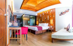 En eller flere senger på et rom på Aonang Phu Pi Maan Resort & Spa
