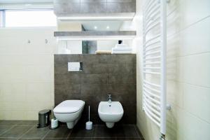 Łazienka w obiekcie Apartamenty Sun & Snow Ustroń Przy Rynku