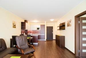 Telewizja i/lub zestaw kina domowego w obiekcie Apartamenty Sun & Snow Ustroń Przy Rynku