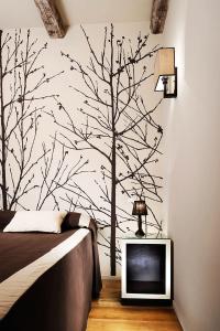 A television and/or entertainment centre at Villaflair - Design Villa Porto Ercole