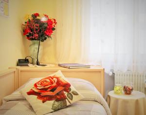 Postel nebo postele na pokoji v ubytování Bed & Breakfast Delle Rose