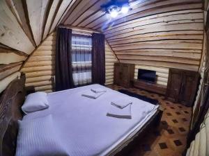 Postel nebo postele na pokoji v ubytování Cottage Hata Zustrich