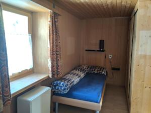 Tempat tidur dalam kamar di Casa Letizia