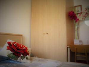 Postel nebo postele na pokoji v ubytování Bed & Breakfast Delle Rose