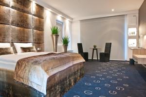 Postel nebo postele na pokoji v ubytování G Design Hotel + 37 fotografií
